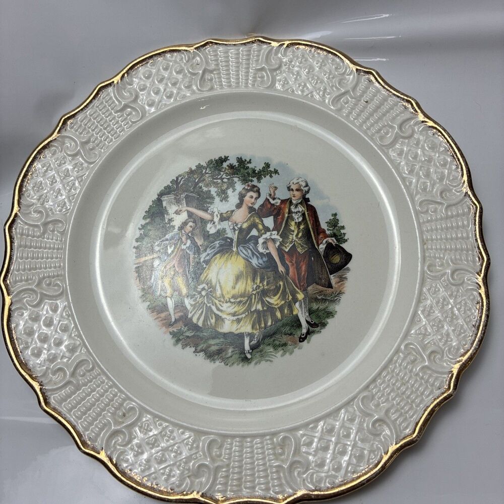 This Vogue Dinnerware Washington Colonial pattern plate with a courting couple